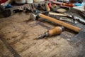 Leather crafting tools on working desk Royalty Free Stock Photo