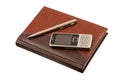 Leather diary, pen and mobile phone Royalty Free Stock Photo