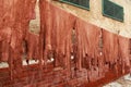 Leather drying on the ropes in old Tannery of Tetouan Medina. Northern Morocco Royalty Free Stock Photo