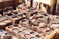 Leather dying in the traditional Chouara Tannery in the city of Fes. Morocco, Africa Royalty Free Stock Photo