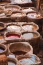 Leather dying in a traditional tannery, Fes, Morocco Royalty Free Stock Photo