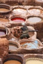 Leather dying in a traditional tannery, Fes, Morocco Royalty Free Stock Photo