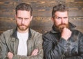 Leather fashion menswear. Handsome stylish and cool. Brutal men wear leather jackets. Men brutal bearded hipster posing Royalty Free Stock Photo