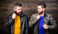 Leather fashion menswear. Men brutal bearded hipster posing in fashionable black leather jackets. Handsome stylish and Royalty Free Stock Photo