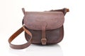 Leather hunting bag with brown ornament with patronage on white background