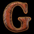 Leather letter G uppercase. 3D render font with skin texture isolated on black background.