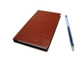 Leather-like brown small agenda and blue ball pen without cap