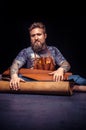 Leather Tanner working with leatherwork Royalty Free Stock Photo