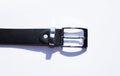 A leather men`s belt on colored background Royalty Free Stock Photo