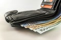 Leather men`s open wallet with euro banknotes bills, coins and c Royalty Free Stock Photo