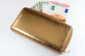 Leather mens open wallet with Euro and dollar banknotes bills Royalty Free Stock Photo