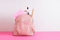 Backpack with school supplies. Back to school concept.