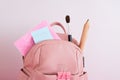 Backpack with school supplies. Back to school concept.