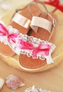 Leather sandals for baby girls with lace and pink bows Royalty Free Stock Photo