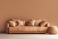 leather sofa with pillows on of brown wall front view, concept of modern minimalist interior. Royalty Free Stock Photo