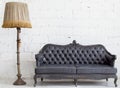 Leather sofa in white room Royalty Free Stock Photo