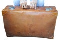 Suitcase and old woman`s hands Royalty Free Stock Photo