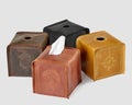 Leather tissue box covers with embossed designs on white