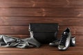 Leather upper metallic trendy womens shoes, scarf and black leather bag Royalty Free Stock Photo