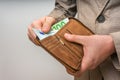 Leather wallet with euro money in male hands Royalty Free Stock Photo