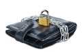 Leather wallet with lock and chain on white isolated background. Concept of protecting electronic money and safety personal financ Royalty Free Stock Photo