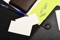 Leather wallet and stationery. Office tools isolated on colourful background, close up. Business and work concept Royalty Free Stock Photo