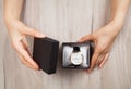 Leather watch. Gift box. Woman hands Royalty Free Stock Photo