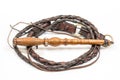Leather whip isolated over white background closeup macro Royalty Free Stock Photo