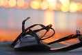 Leather woman sandal in sunset background