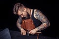 Skinner forms new leather product in the shop