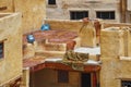 The leathers are dried on the roofs of the old tannery buildings in Fez. Morocco. The tanning industry in the city is considered Royalty Free Stock Photo