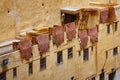 The leathers are dried on the roofs of the old tannery buildings in Fez. Morocco. The tanning industry in the city is considered Royalty Free Stock Photo