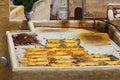 The leathers are dried on the roofs of the old tannery buildings in Fez. Morocco. The tanning industry in the city is considered Royalty Free Stock Photo