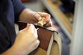 Leatherworker sewing