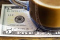 Leave Tipping for the waiter in the cafe. A cup of coffee and a 5 dollar bill.