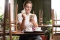 Leave tipping for the waiter in cafe. salary or tips, counting money with satisfaction on face. waitress while count Royalty Free Stock Photo