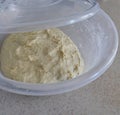 Leavened dough in a bowl, yeast dough, homemade natural dough