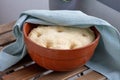 Leavened dough in ceramic bowl Royalty Free Stock Photo