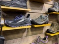 Leavenworth, WA USA - circa December 2022: Close up view of outdoor boots and shoes for sale inside a local sporting goods shop