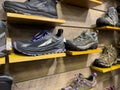 Leavenworth, WA USA - circa December 2022: Close up view of outdoor boots and shoes for sale inside a local sporting goods shop