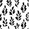 Leaves and branches vector seamless pattern. Organic motif, herbs element painted with a brush. Royalty Free Stock Photo