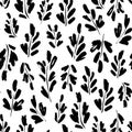 Leaves and branches vector seamless pattern. Organic motif, herbs element painted with a brush. Royalty Free Stock Photo