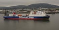 Leaving port, Roll on roll off ferry with deck cargo departs Belfast docks. Northern Ireland. Royalty Free Stock Photo