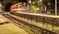 Leaving train into the tunnel from the train station with light trails Royalty Free Stock Photo