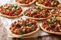 Lebanese Arab pizza with meat, tomatoes, spices and pine nuts closeup. horizontal Royalty Free Stock Photo