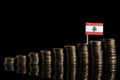 Lebanese flag with lot of coins on black