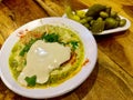 Lebanese Hummus dish with tahini. Pita bread. Pickles. Middle eastern cuisine . Top view. Royalty Free Stock Photo