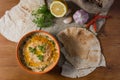 Lebanese hummus salad on rustic wooden table Royalty Free Stock Photo