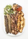 Lebanese Mixed Grill plate isolated on white Royalty Free Stock Photo