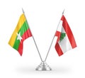 Lebanon and Myanmar table flags isolated on white 3D rendering